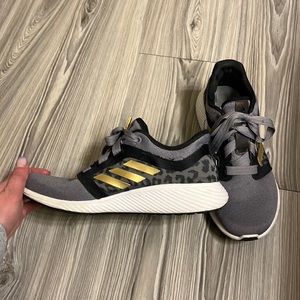 Adidas Edge Lux running shoes. Gold, gray, black with leopard/cheetah detail